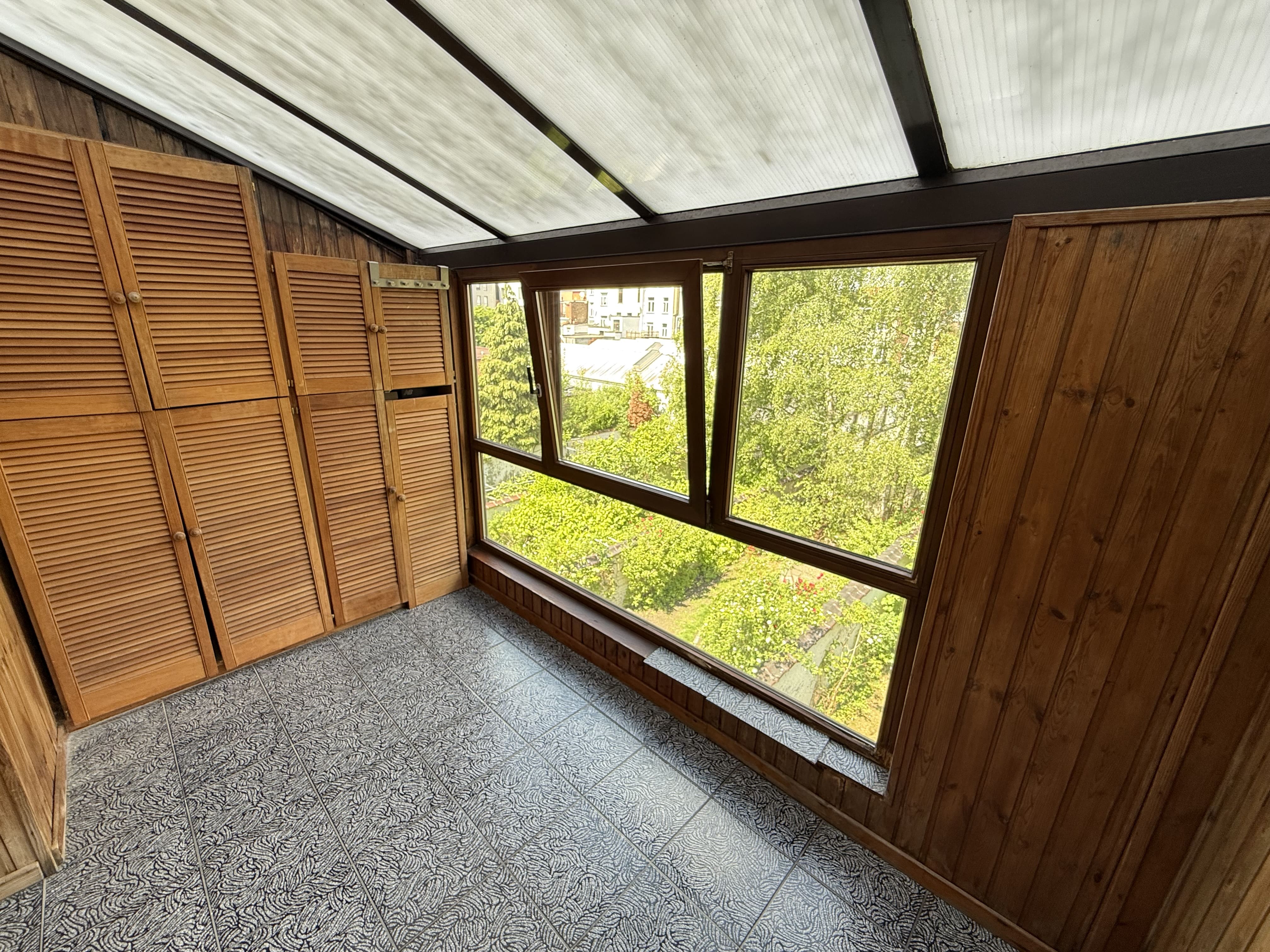Véranda 1er étage vue dégagée - Maison Schaerbeek Voltaire Bruxelles immobilier