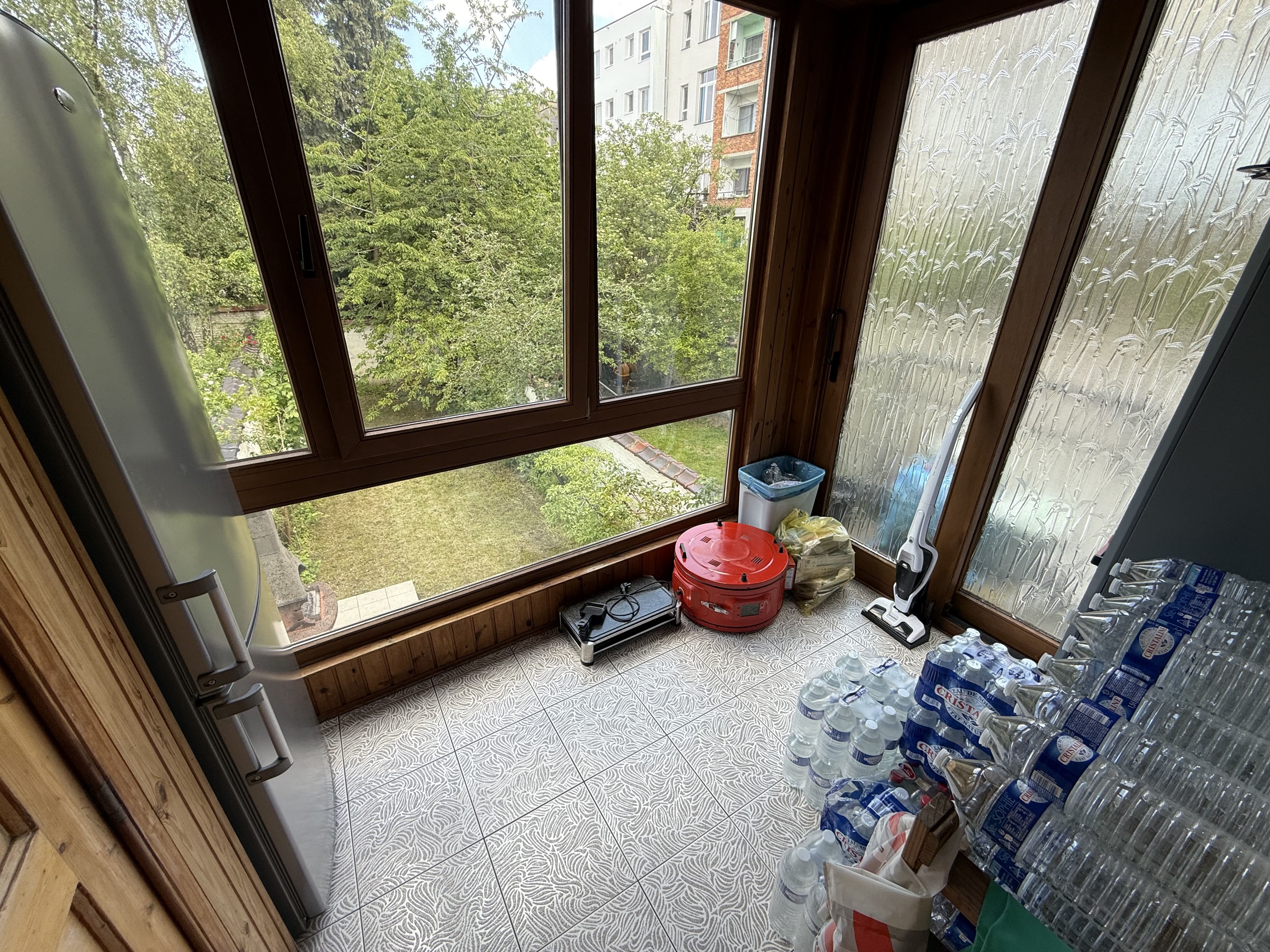 Véranda rez-de-chaussée vue jardin - Maison Schaerbeek Voltaire 200m² jardin Bruxelles